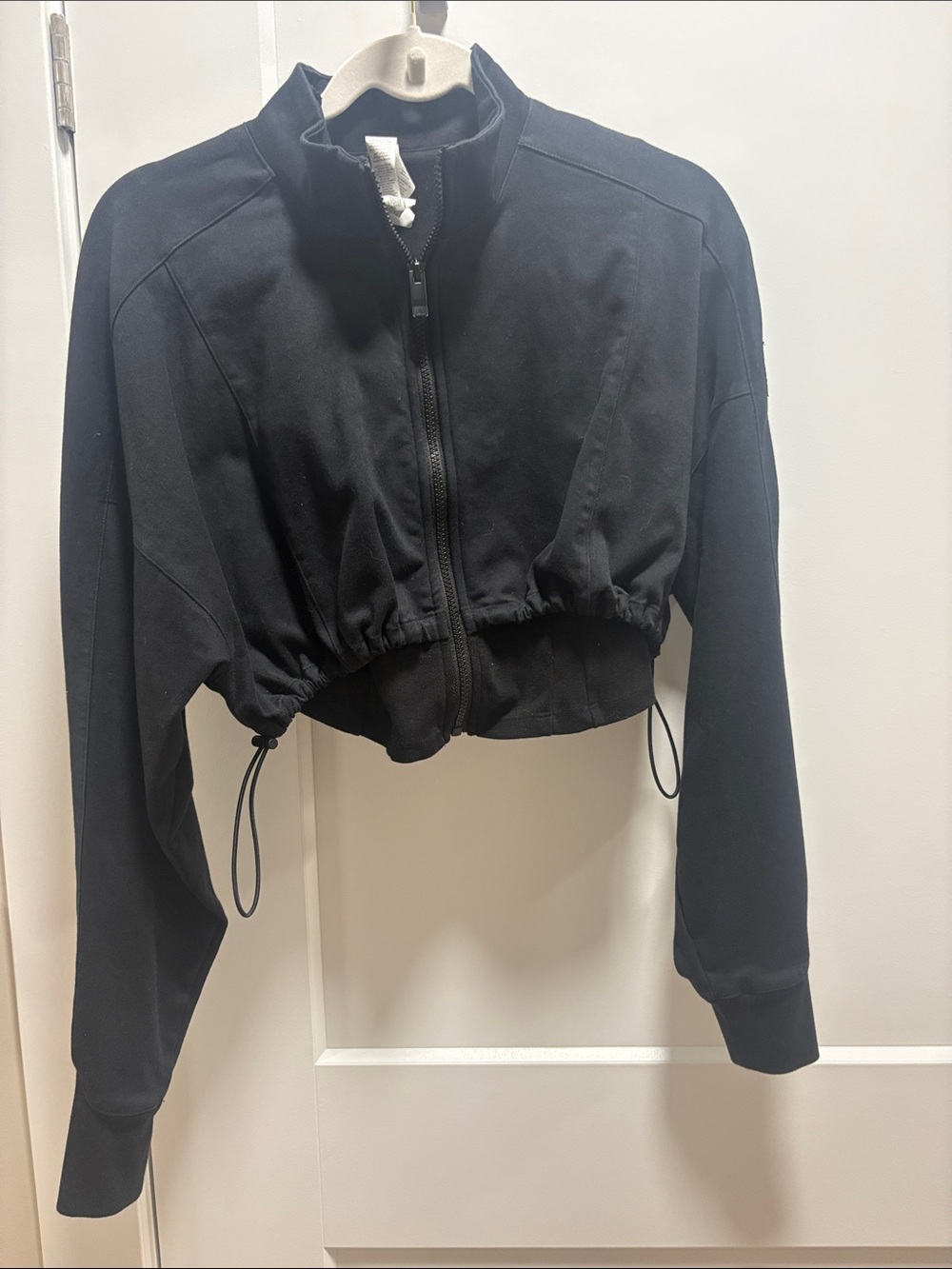 ALO Yoga Black Cropped Bomber Jacket with Drawcord. Lighting is terrible. Medium